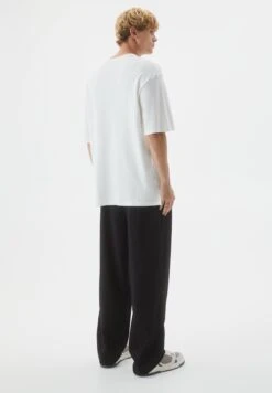 PULL & BEAR Wide Leg TailoredPantaloniBlack Uomo Pantaloni PUC22E0F1-Q11 -PULL - BEAR Negozio cf2c3b86b5fc429dbad93f96206ea85c